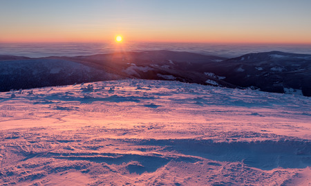 View of winter wonderland during the sunset time, panoramic picture.の写真素材