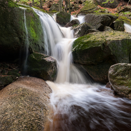 Panoramic view of a beautiful spring waterfall.の写真素材
