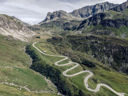 Drone photo of winding roads on Julierpass in Switzerlandの写真素材