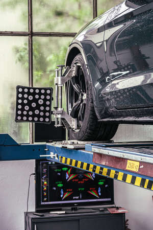 fixing your car at the garage by a mechanicの写真素材