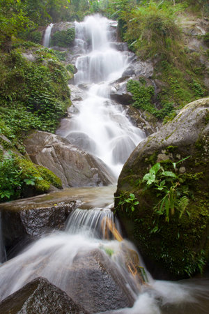 Waterfall in mountain jungle near Chiang Rai, Thailandの写真素材