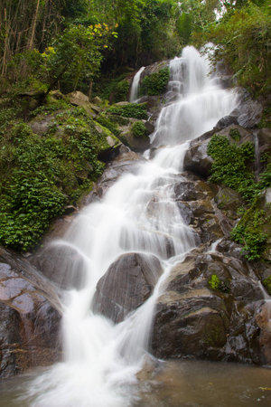 Waterfall in mountain jungle near Chiang Rai, Thailandの写真素材
