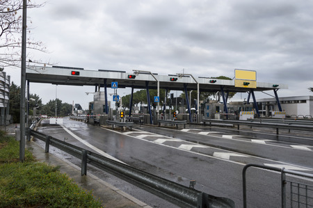 toll booth with wet road