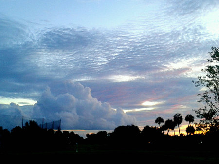 Beautiful sunrise with big beautiful colorful clouds in Tampa Floridaの素材