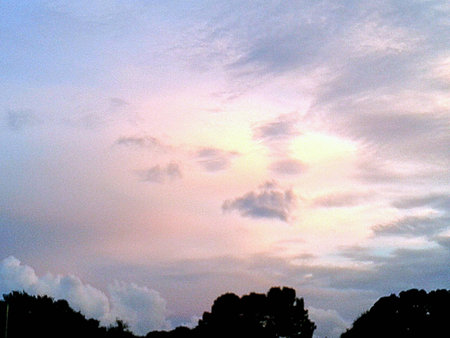 Beautiful sunrise with big beautiful colorful clouds in Tampa Floridaの素材