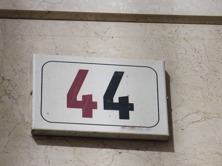 Stylish house number depicting 44 in two colours