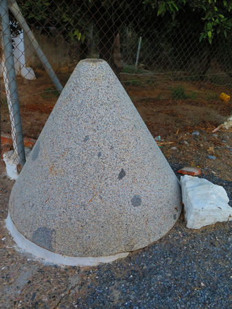 Old Cone shaped olive oil millstoneの写真素材