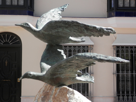 FUENGIROLA, SPAIN - MARCH 3RD. Two  birds on a fountain. Fuengirola, Spain. March 3rd 2016のeditorial素材
