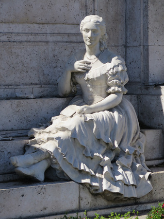 Statue of Sitting young lady in Malaga Centre, Spainのeditorial素材