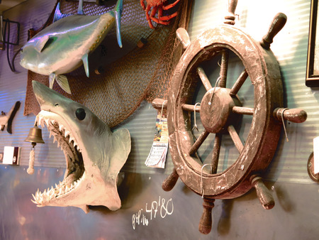 Sharks head and rudder wheel in fish market stall in Malaga Atarazana marketのeditorial素材