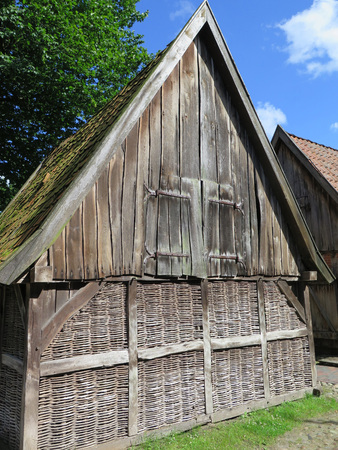 Wooden outhouse with lattice walls in Bad Zwischenahn, Northwest Germanyのeditorial素材