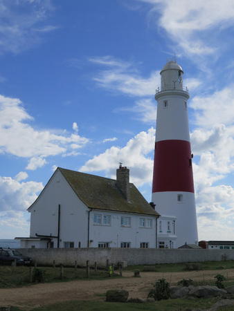 Lighthouse at Portland Bill, Dorset, UK against cloudy skyのeditorial素材