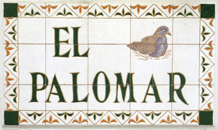 Tiled Spanish Village Street Sign on wallのeditorial素材