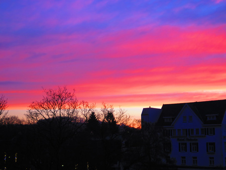 colorful winter sunrise over town in Holland