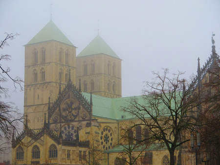 Munster, Germany - December 28, 2016: Foggy grey morning in City streetsのeditorial素材