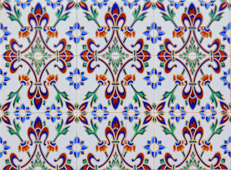 Closeup of Wall tiled with colorful floral ceramic tiles