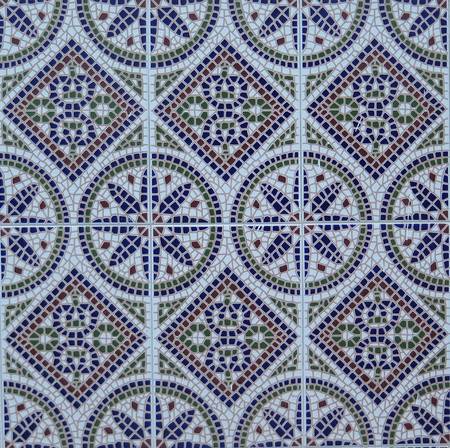 Closeup of Wall tiled with colorful floral ceramic tilesの写真素材