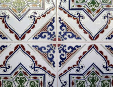 Closeup of Wall tiled with colorful ceramic tiles in Andalusian village