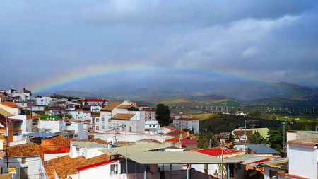 Shallow Rainbow over Guadalhorce valley in Andalusiaの写真素材