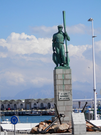 Tarifa, Spain - April 1, 2019: View of the fisherman statue in the port (A Los Hombres de la Mar), Tarifa, Cadiz Province, Andalusia, Spainのeditorial素材