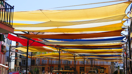 Cloth covered main square in Andalusian village ready for annual aeek long festivalのeditorial素材