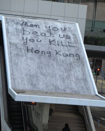 Hong Kong, East Asia - November 15, 2019: Writing on overhang from recent Hong Kong protestsのeditorial素材