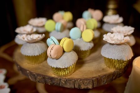 Colorful round cookie on dessert Colorful round cookie on dessert on wooden tableの写真素材
