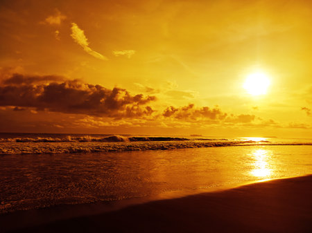 Orange sky sunset at beachの写真素材