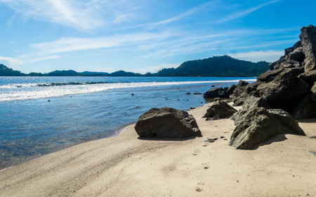 Beautiful beach with rocks in sunny dayの写真素材