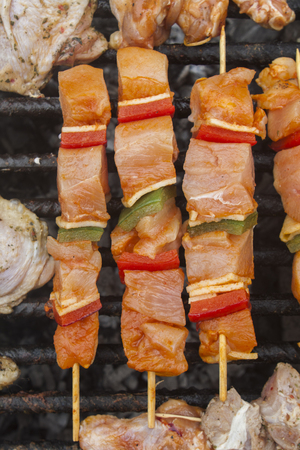 barbecue meat and vegetables on stickの写真素材