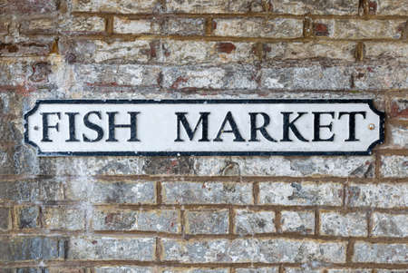 Fish Market street sign on a brick wallの写真素材