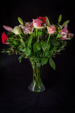 A beautiful bouquet of flowers in a vaseの写真素材