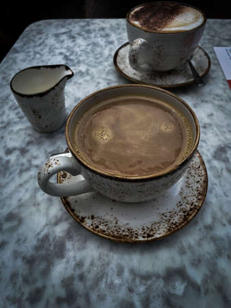 Leisurely coffee in cafe in Beckenhamの写真素材
