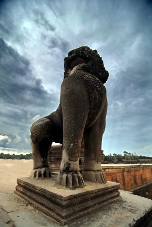 The lion statue of Angor Wat bridge in the morning の写真素材