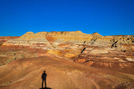 Trekking in The Wucai City Scenic Area near Urumqi, Xinjiang, has a magnificent and dazzling view of the Danxia landform.の写真素材