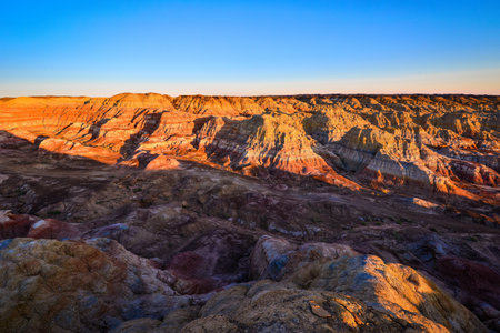 Trekking in The Wucai City Scenic Area near Urumqi, Xinjiang, has a magnificent and dazzling view of the Danxia landform.の写真素材