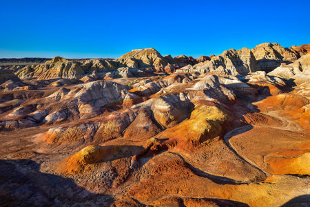 Trekking in The Wucai City Scenic Area near Urumqi, Xinjiang, has a magnificent and dazzling view of the Danxia landform.の写真素材
