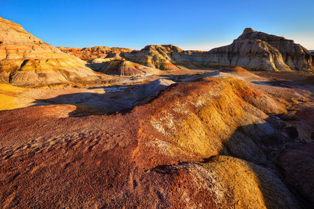 Trekking in The Wucai City Scenic Area near Urumqi, Xinjiang, has a magnificent and dazzling view of the Danxia landform.の写真素材