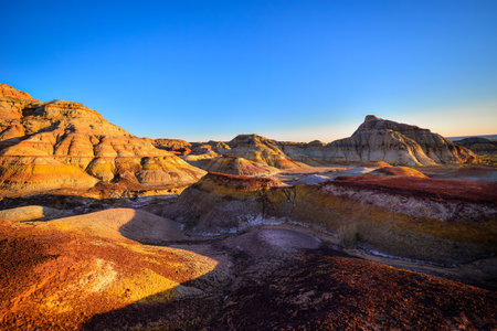 Trekking in The Wucai City Scenic Area near Urumqi, Xinjiang, has a magnificent and dazzling view of the Danxia landform.の写真素材