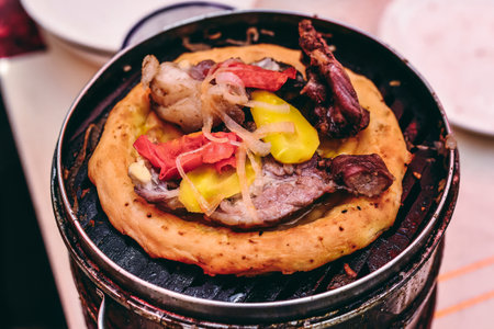 Mutton roasted naan, hand pilaf and yogurt are common delicacies in Xinjiangの写真素材
