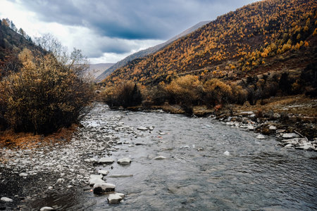 Stunning scenery of the alpine region in western Sichuan, China, with mountains, forests, lakes and rapids in different seasonsの写真素材