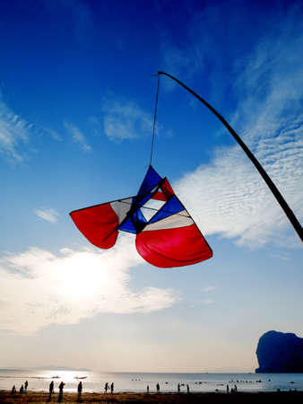 A beautiful Thai style kite on blue sky at Thailand beach