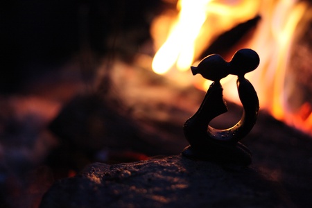 Kissing in the firelightの写真素材