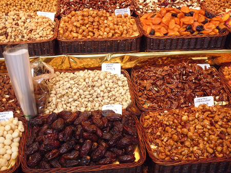 Dried Fruit & Nuts on a Market Stall in Italyの写真素材