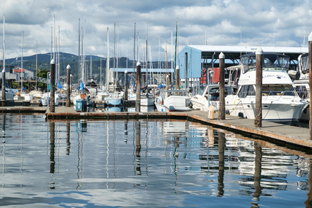 Port Orchard, WA, USA September 4, 2016: Pleasure boats of all types and sizes in Port Orchard marina under sunny, cloudy skiesのeditorial素材