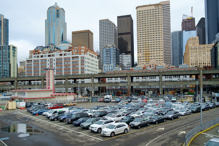 Seattle, WA, USA Feb. 11, 2017: Vehicles lines up waiting to load onto ferry at Coleman Ferry Dock at Pier 56 in Seattle, WAのeditorial素材