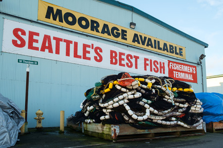 Seattle, WA, USA Mar. 4, 2017: Commercial fishing nets piled onto a pallet outside a net shed at Fishermens Terminal in Seattle, Washingtonのeditorial素材