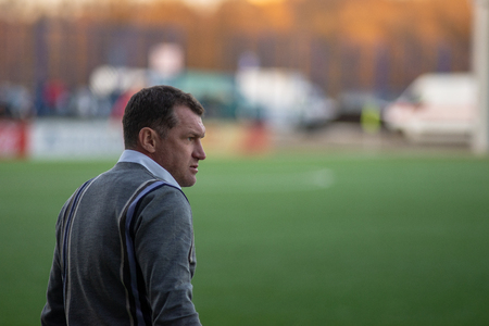 MINSK, BELARUS - APRIL 7, 2018: Sergei Gurenko, head coach of FC Dynamo Minsk react during the Belarusian Premier League football match between FC Dynamo Minsk and FC Isloch at the FC Minsk Stadium.のeditorial素材