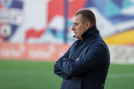 MINSK, BELARUS - APRIL 7, 2018: Vitaly Zhukovsky, head coach of FC Isloch looks during the...