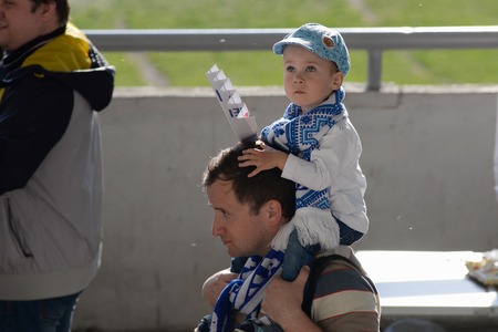 MINSK, BELARUS - MAY 23, 2018: Little fan having fun before the Belarusian Premier League football match between FC Dynamo Minsk and FC Bate at the Tractor stadium.のeditorial素材